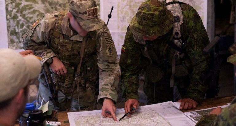 army pointing at map